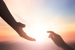 helping hand outstretched for salvation on isolated toned backgr adobestock 194666604
